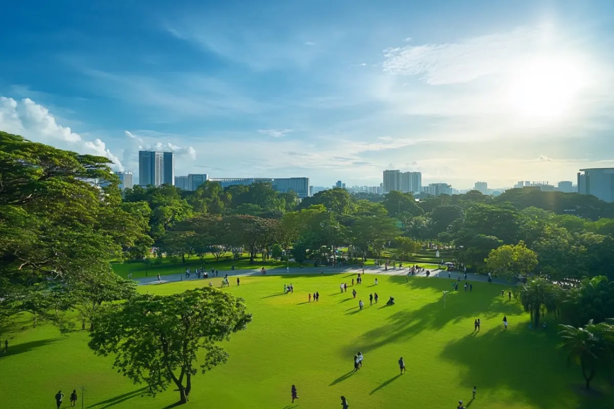 New Carbon Credit Guidelines from Singapore Target Market Confidence_Panoramic view of Singapore with lush greenery, people enjoying parks, and a clear blue sky_visual 1